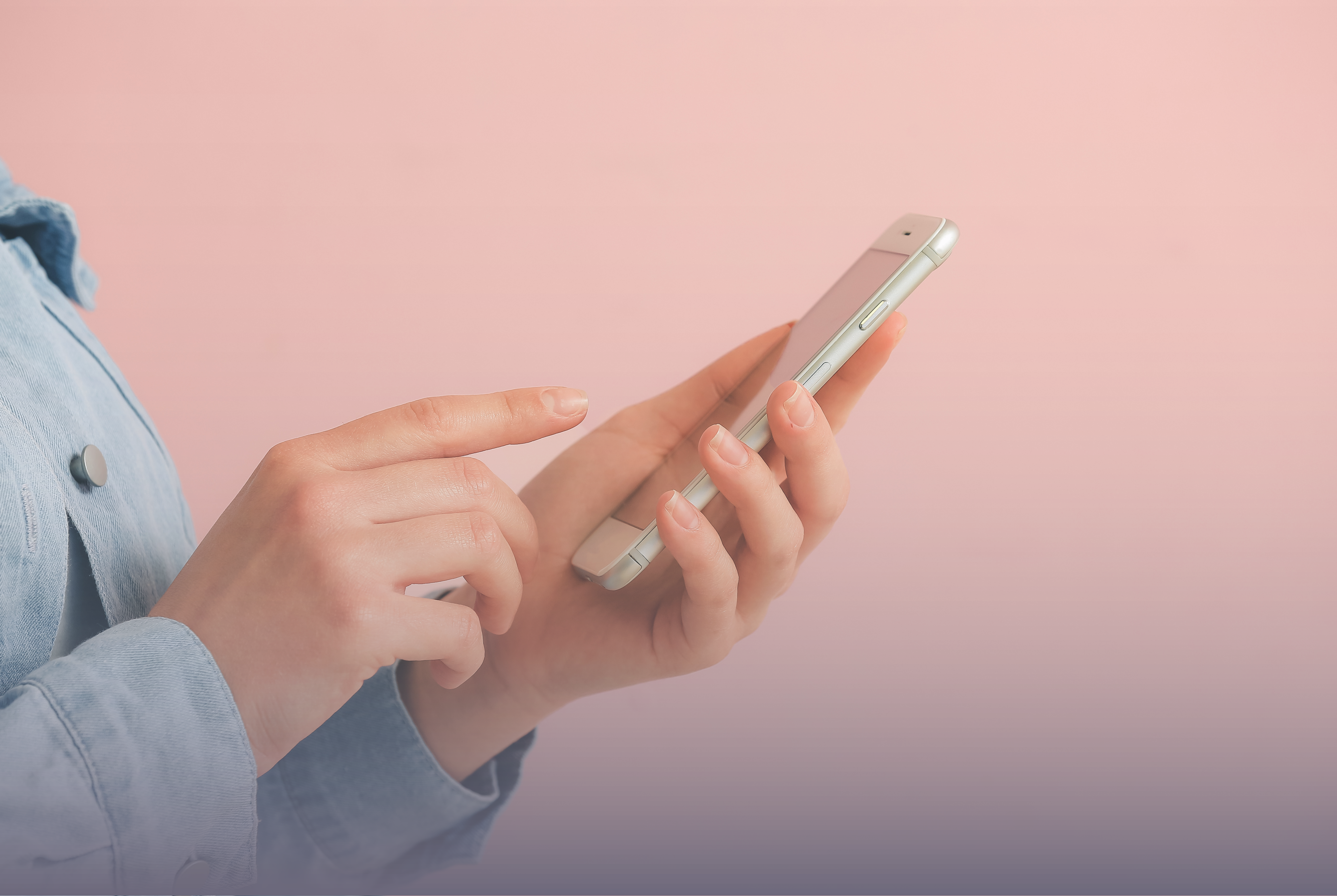 A Person Using Their Mobile Phone Banner