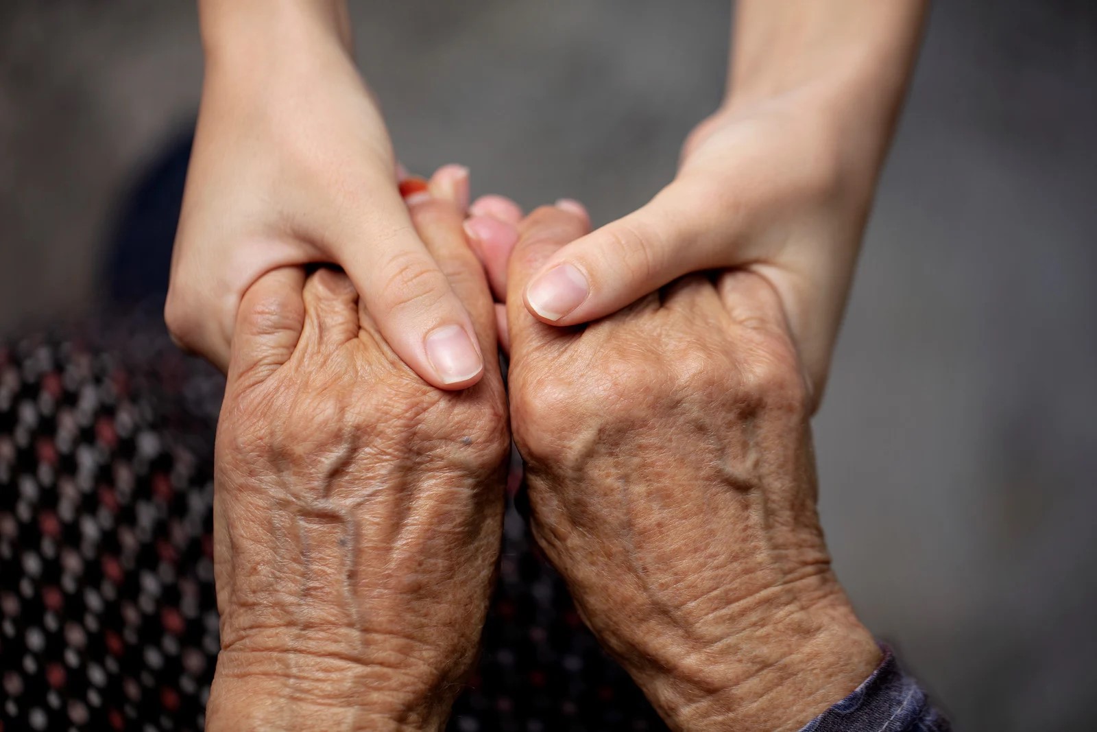 Elderly Care Holding Hands