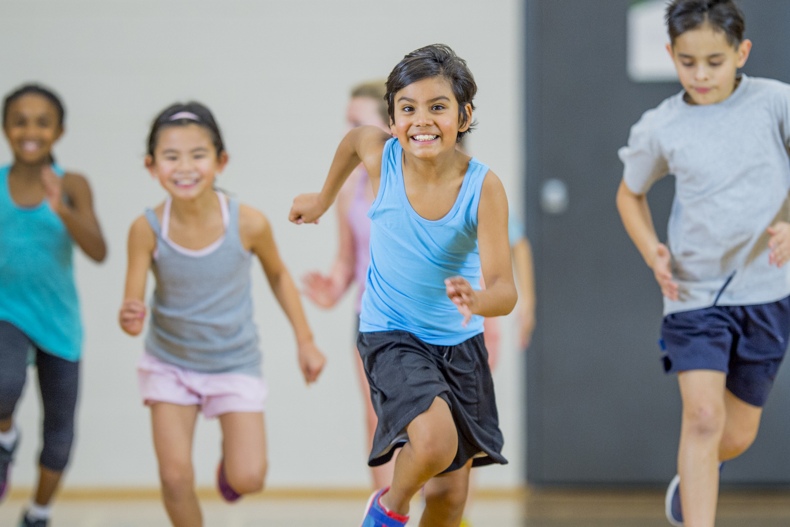 Children Running In Gym Class